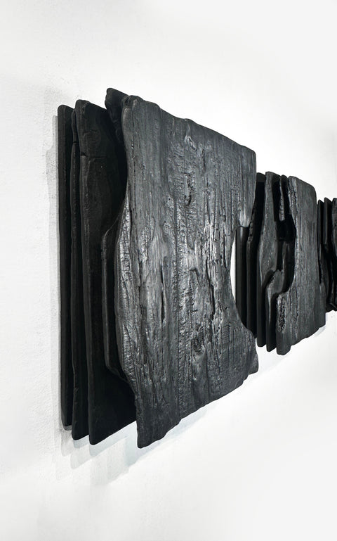 textured charcoal wall sculpture wabi sabi style