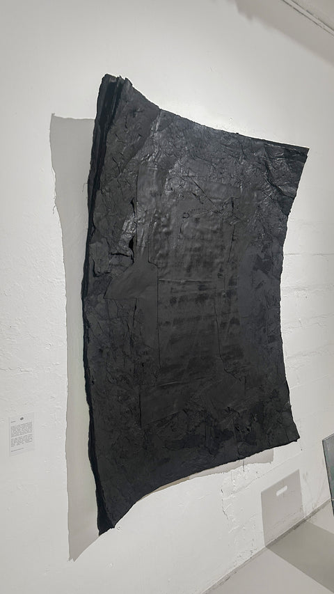 Sculpture murale « Si Dieu est en toutes choses. »