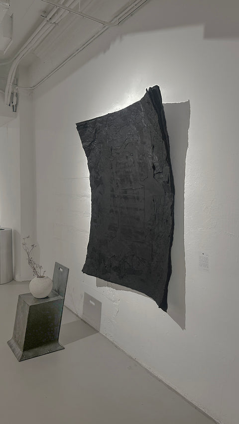 Sculpture murale « Si Dieu est en toutes choses. »