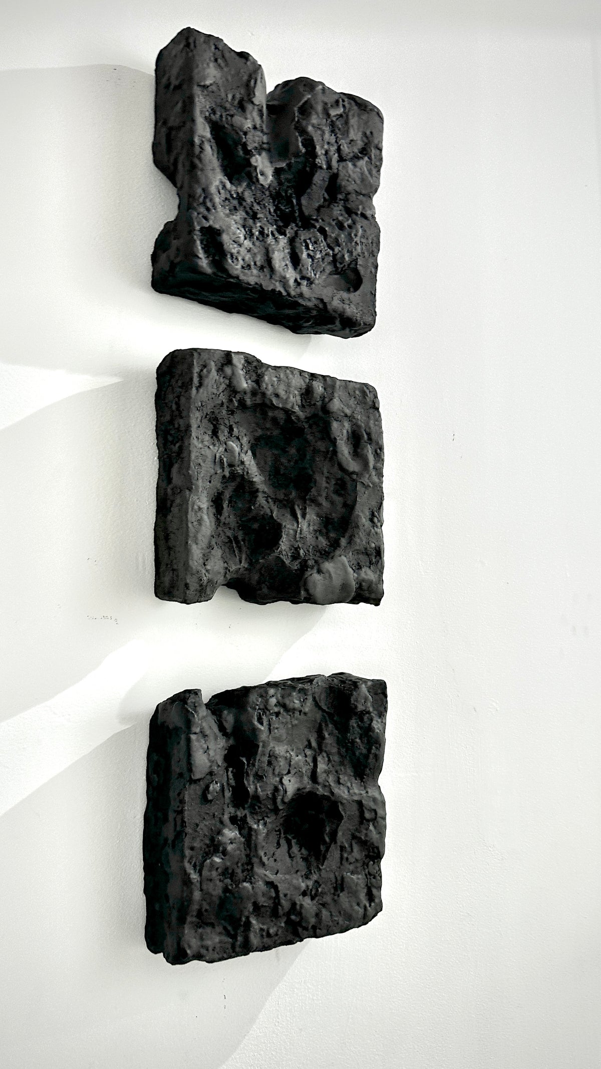 GAIA — Black Raw, 3-piece arrangement, rough black plaster panels, SIZMARI Brooklyn