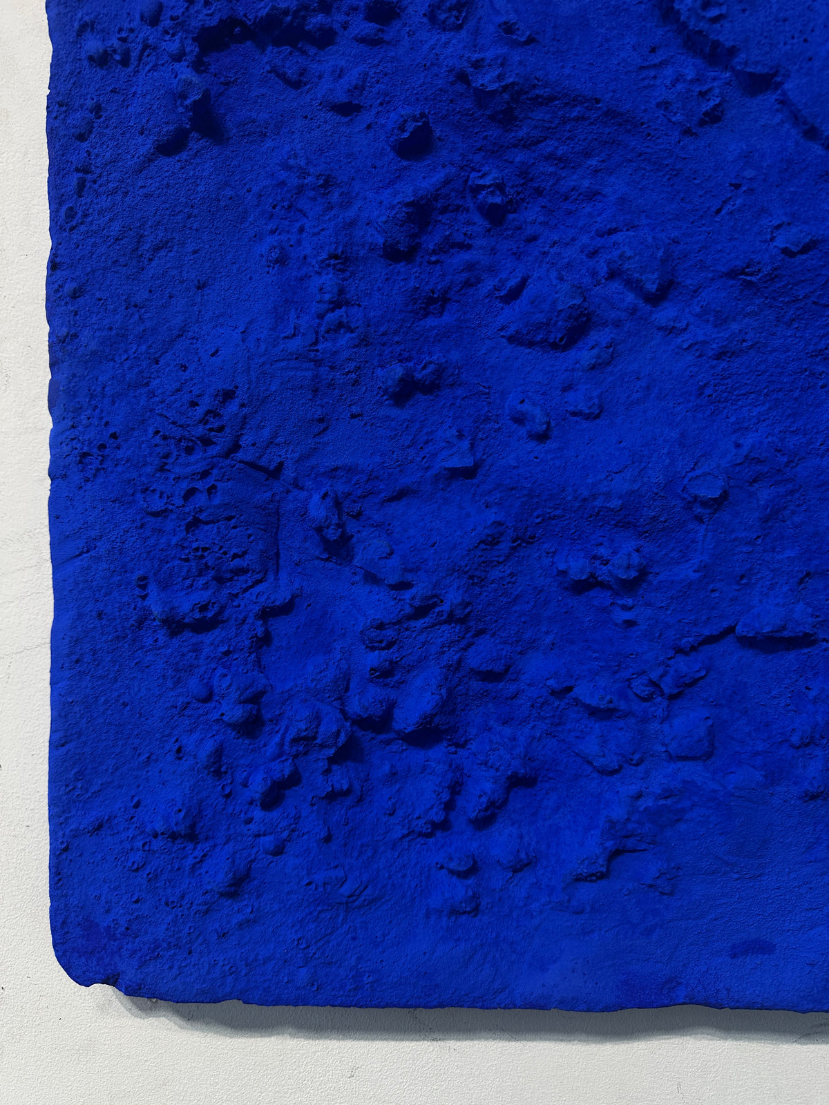 STRATUM — Ultramarine Blue, close-up of matte pigment and cratered relief