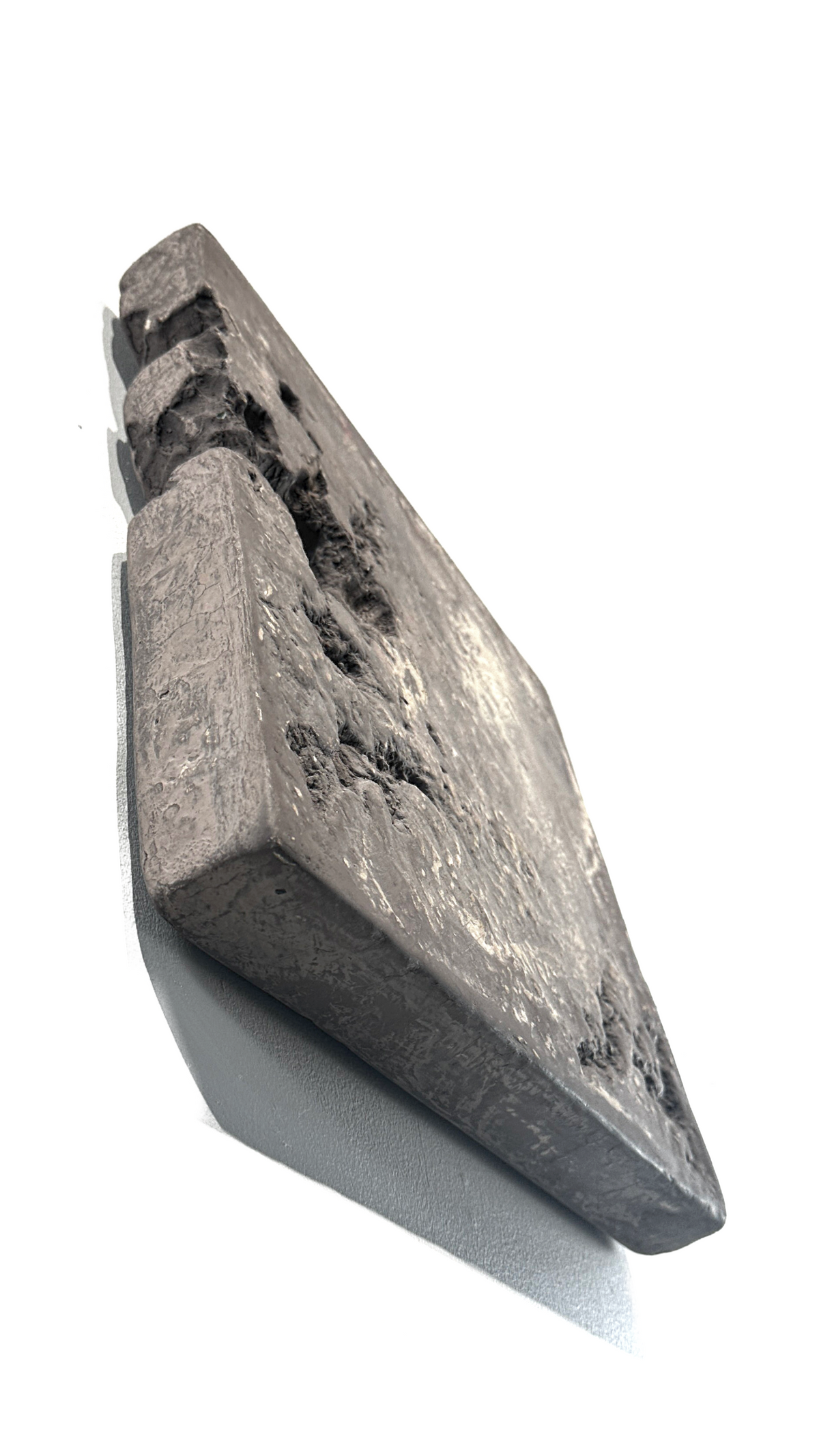 GAIA — Taupe, close-up surface texture, warm gray-brown plaster, matte finish