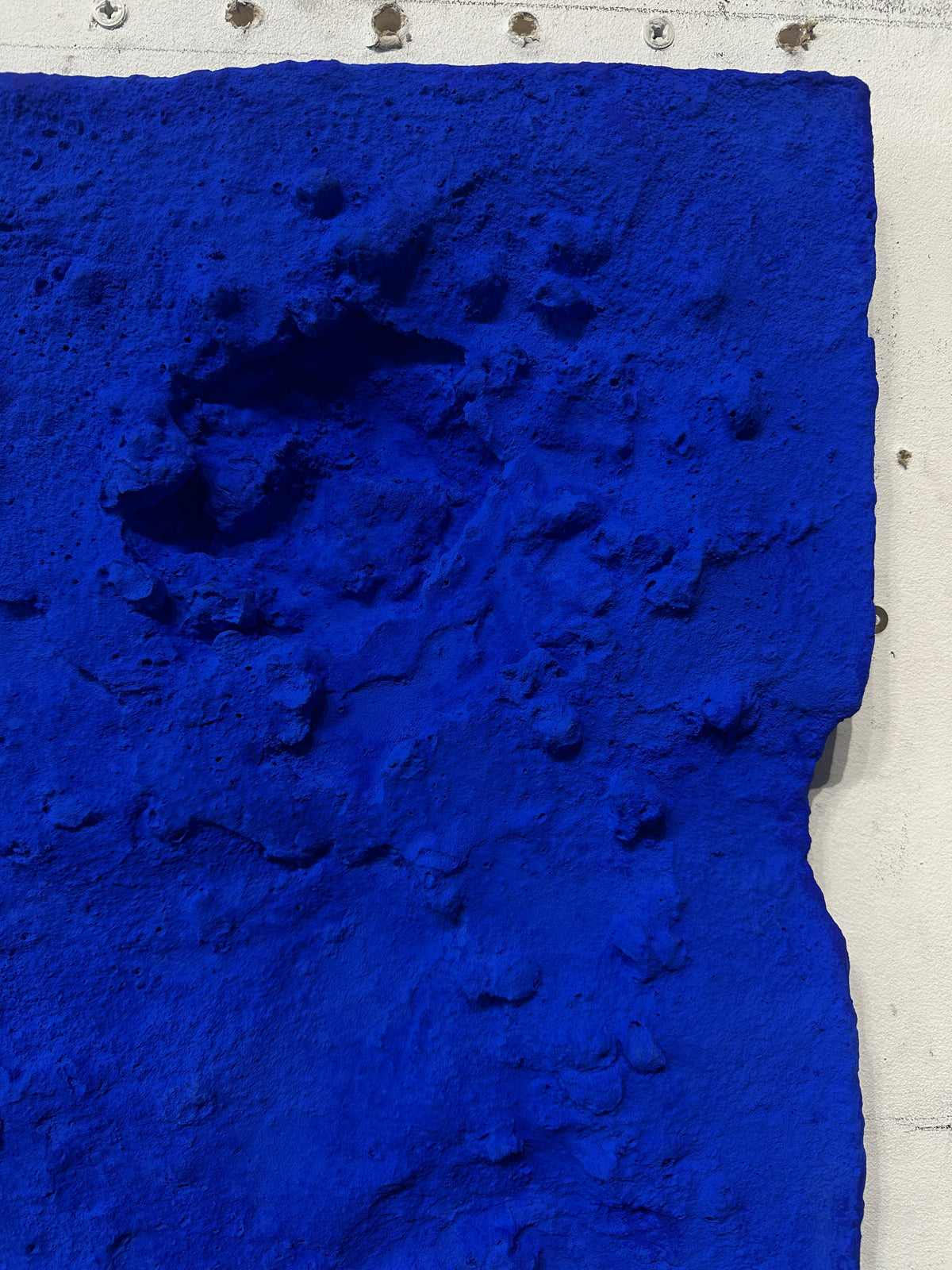 STRATUM — Ultramarine Blue, detail of deep hollow in blue pigment surface