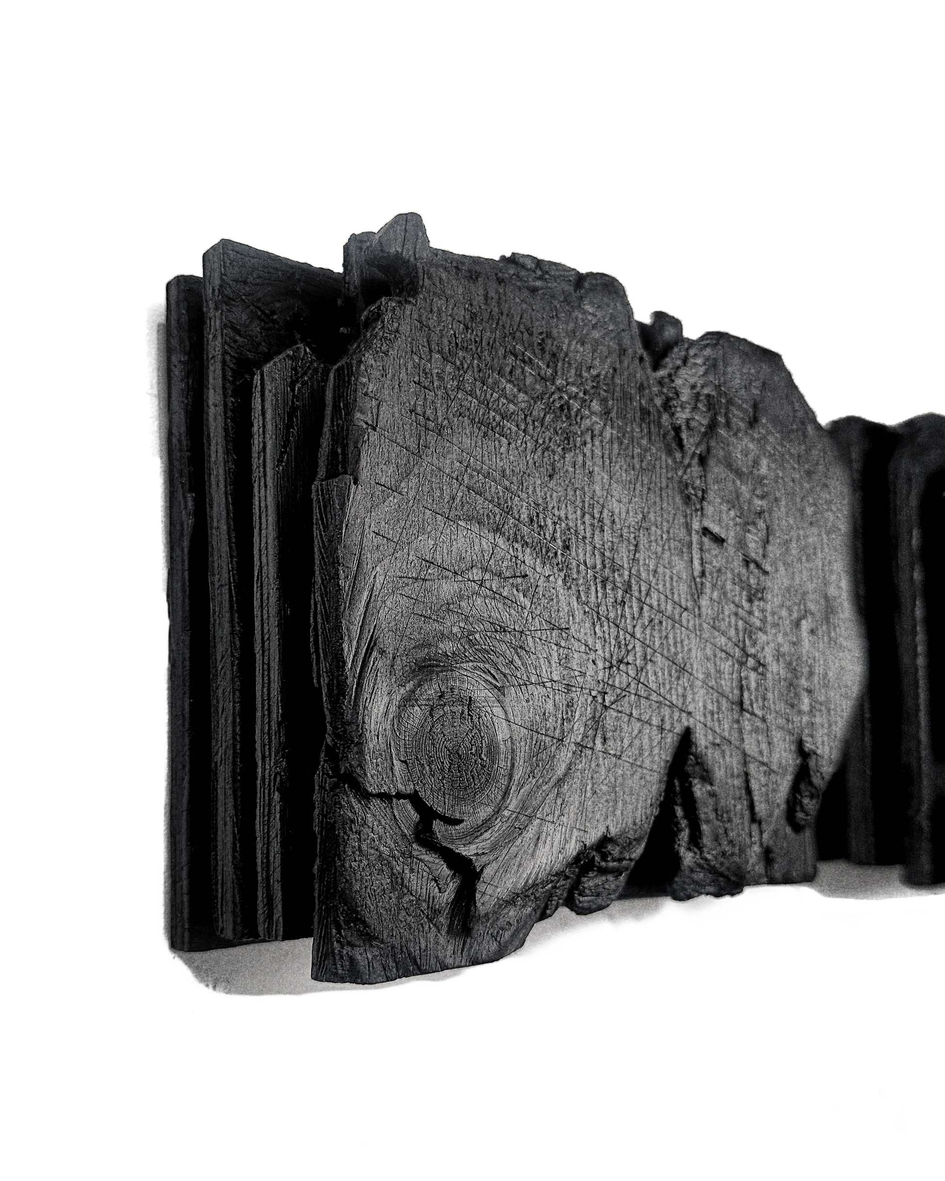 textured charcoal wall sculpture wabi sabi style