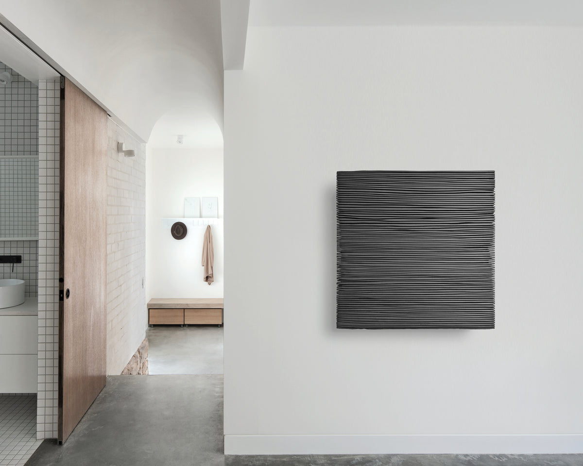SHADOW large-format relief — full installation view