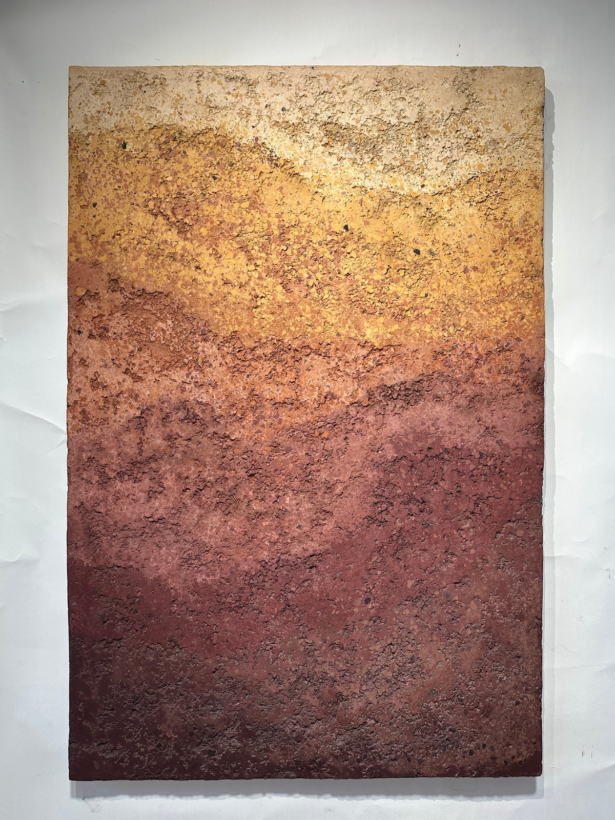 CHROMATERRA plaster wall sculpture by SIZMARI Studio, ochre to umber gradient, full view