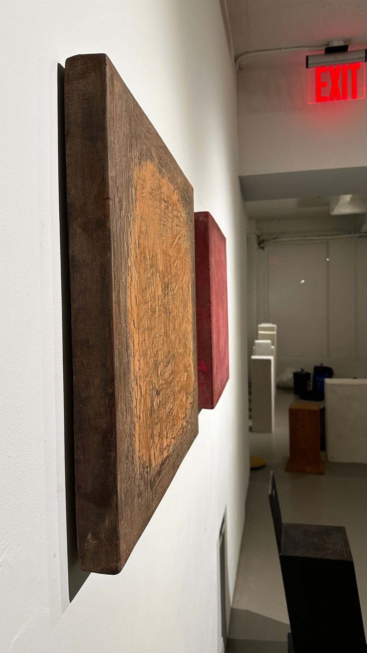 INSIDE OUT — Rusty Terracotta, full view, warm orange-red earth tones, hand-sculpted plaster