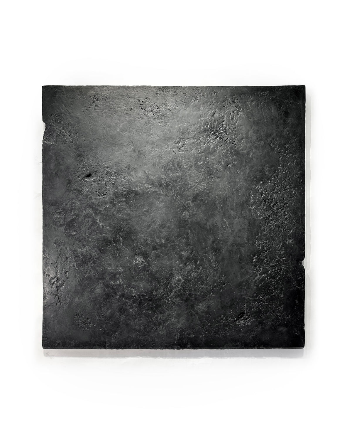 GAIA — Black Calm, wall installation view, black sculptural relief in contemporary interior