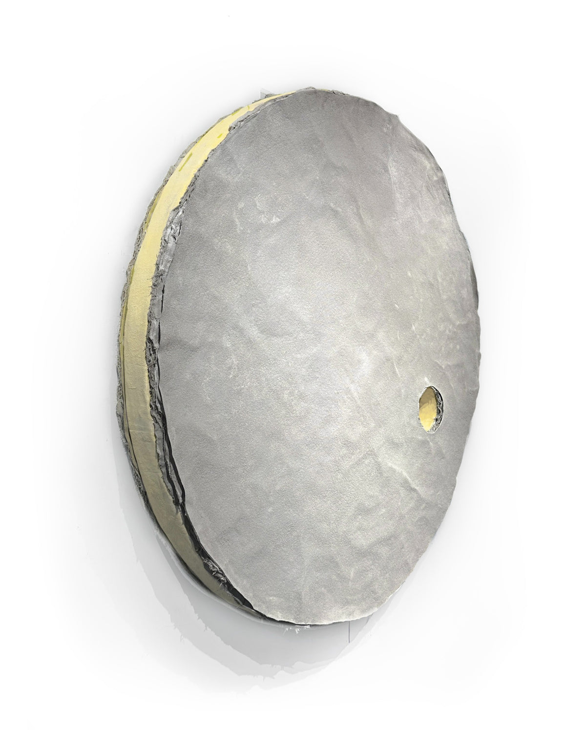 HELIOS — large round pale gray relief with yellow edge and small opening, side view