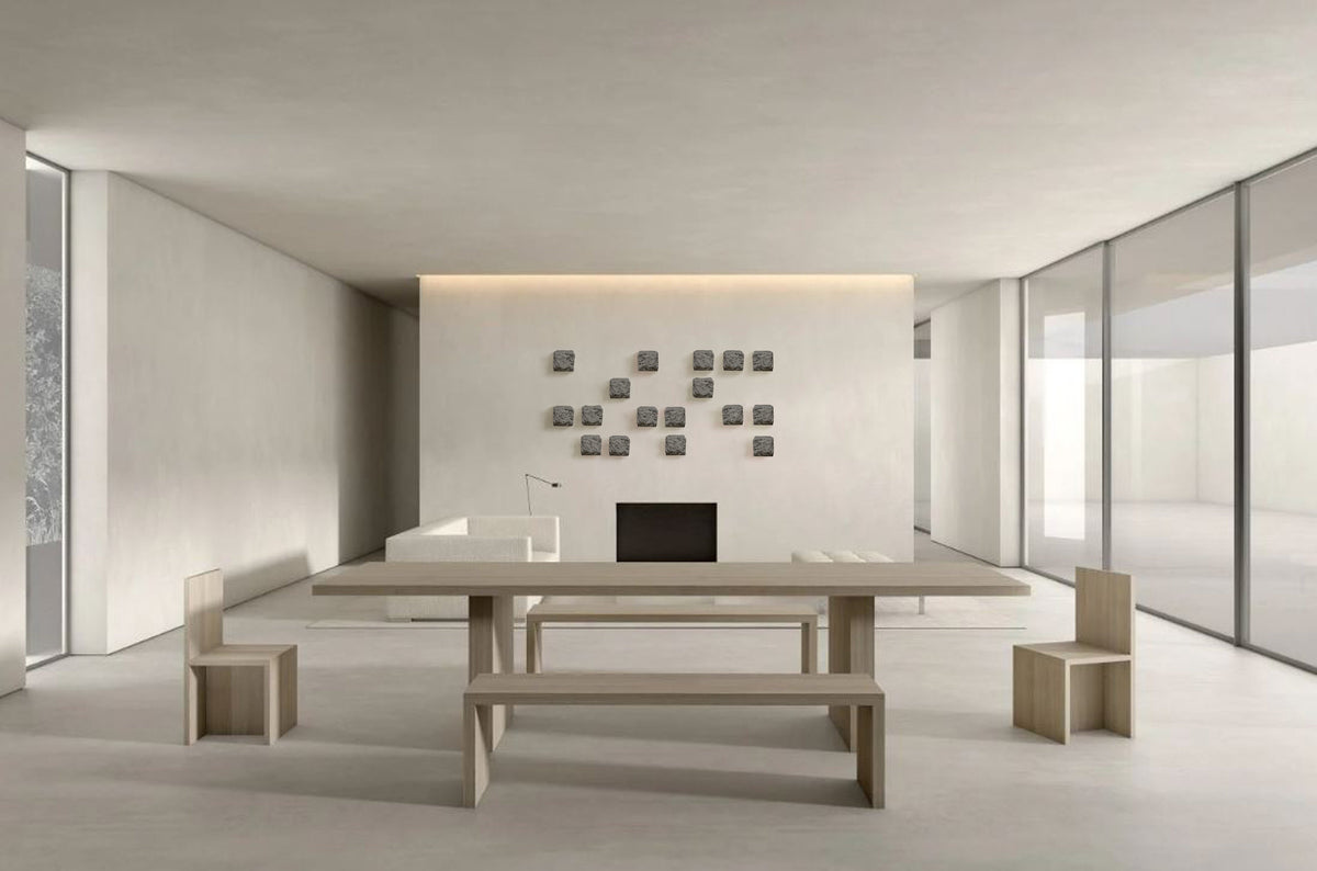 BROX — Charcoal Black, grouping of small blocks above a long table in a minimal interior