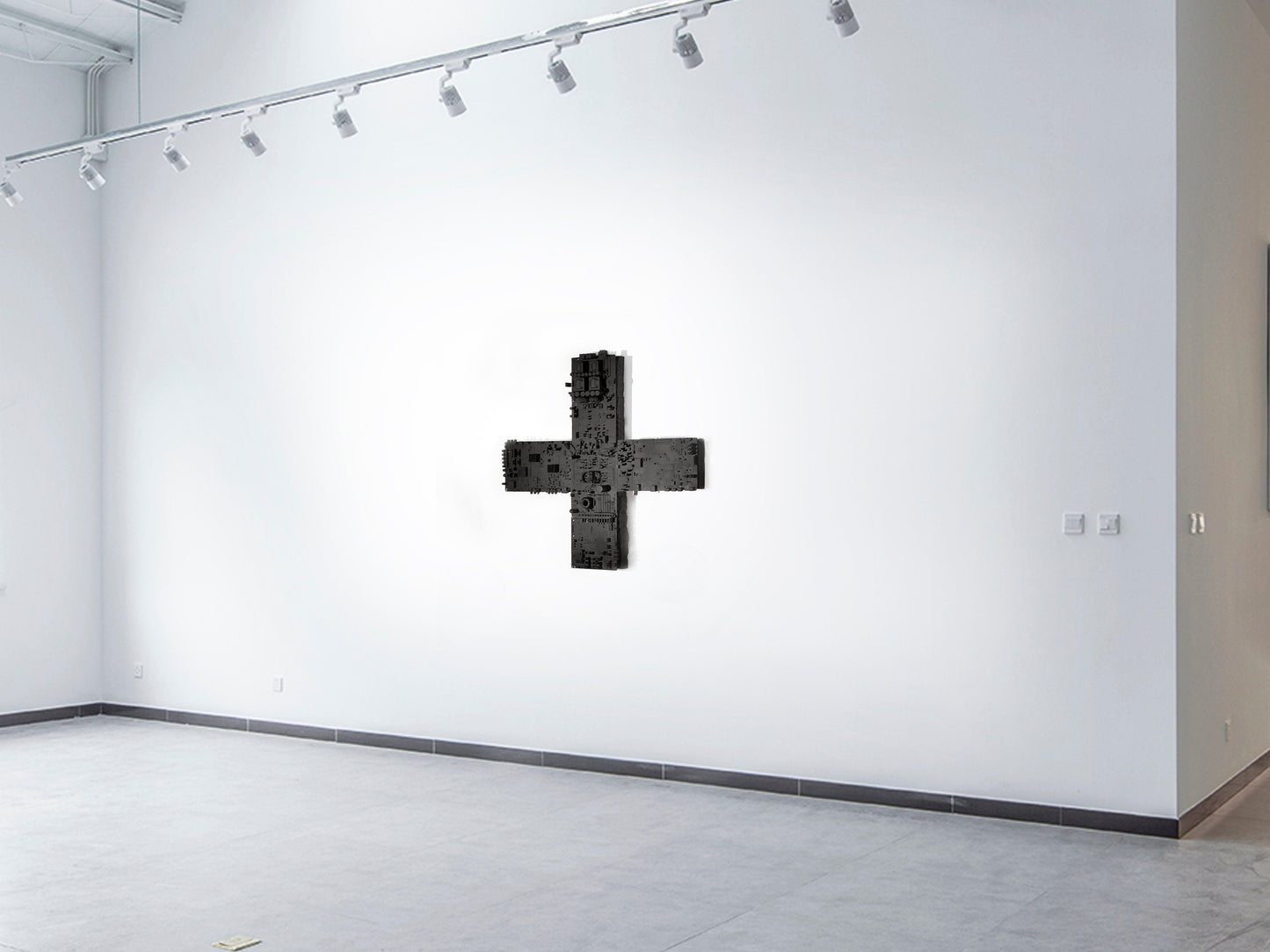 Sculpture murale « Si Dieu est en toutes choses. »