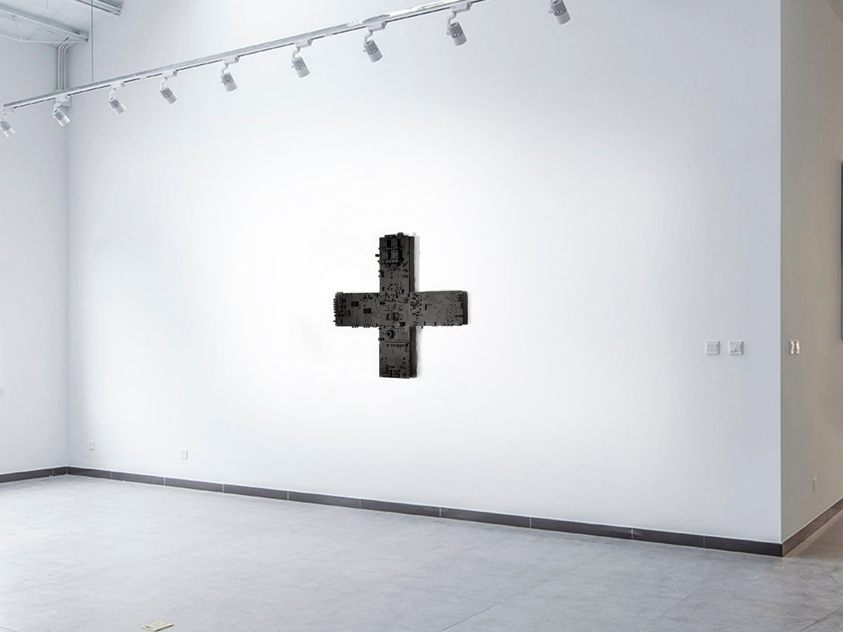 IF GOD IS IN ALL THINGS — black cross relief centered on a white gallery wall