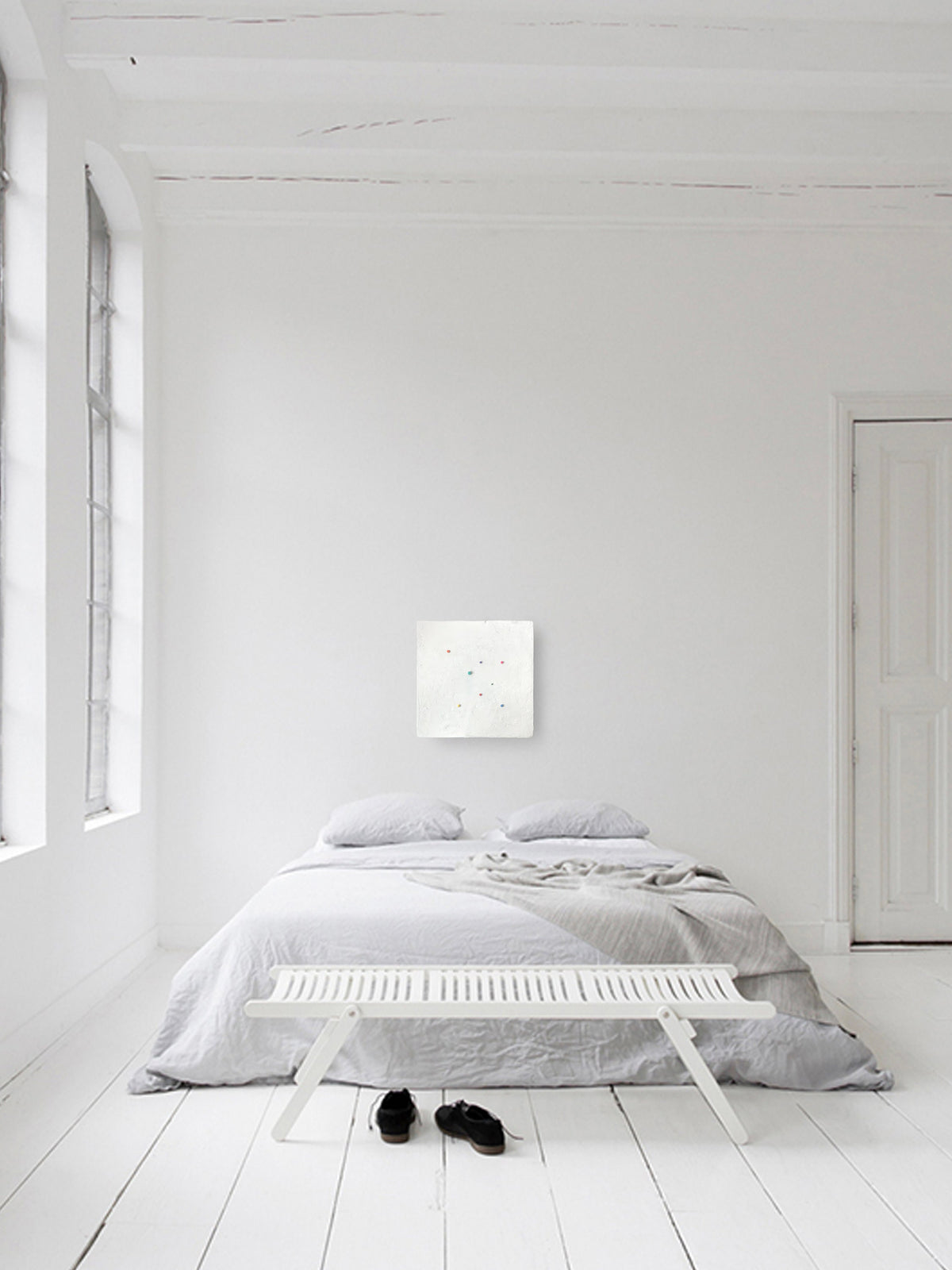 SHUN — White base, white panel above a bed in an all-white bedroom