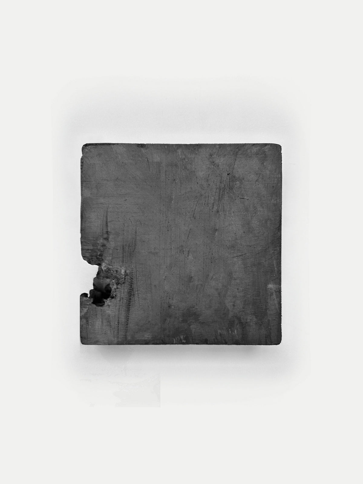 CONCRETICA — Graffiti Grey, single square panel with eroded corner, frontal view