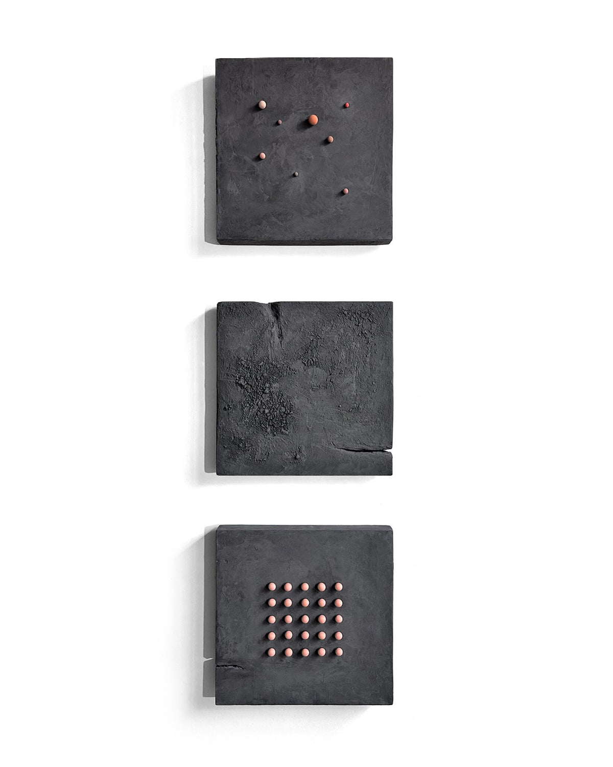 SHUN — Black base, three-panel vertical arrangement, frontal view on white