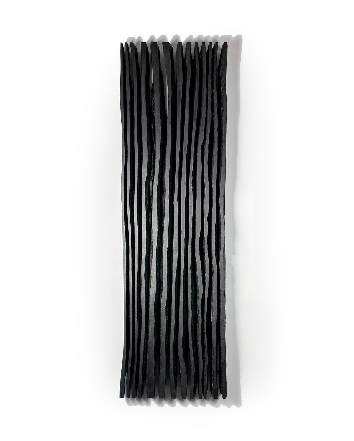 SHADOW — Noir Aurora, vertical blade wall sculpture, studio view, SIZMARI Brooklyn